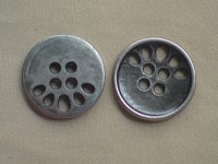 Holes Button